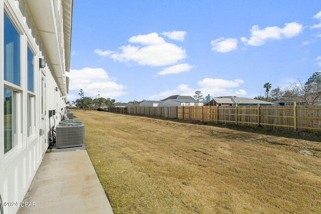 Building Photo - 6997 Patronis Dr
