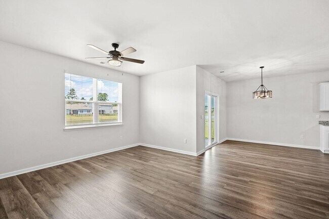 Building Photo - Modern 4BR Home with Screened Porch & Pond Views | Sun Colony, Longs SC