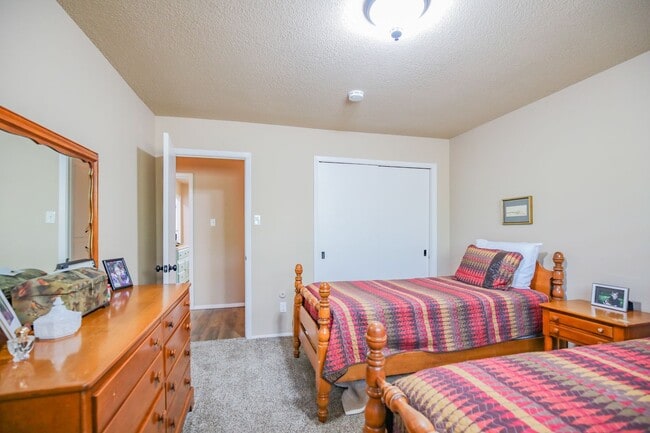 Building Photo - Three Bedroom Home with Plush Backyard