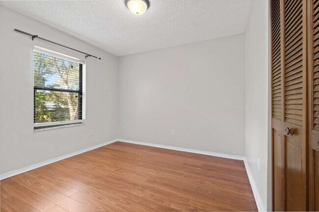 Building Photo - Comfort, Space & Convenience on a Peaceful Corner Lot in the Shores