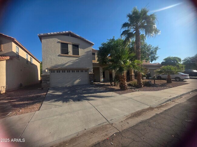 Building Photo - 9209 W Lewis Ave