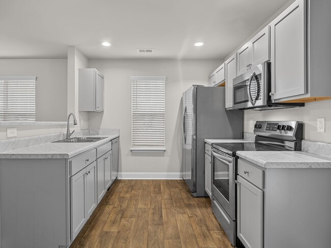 Building Photo - Charming two bedroom two and a half bathroom ready for you to call home!