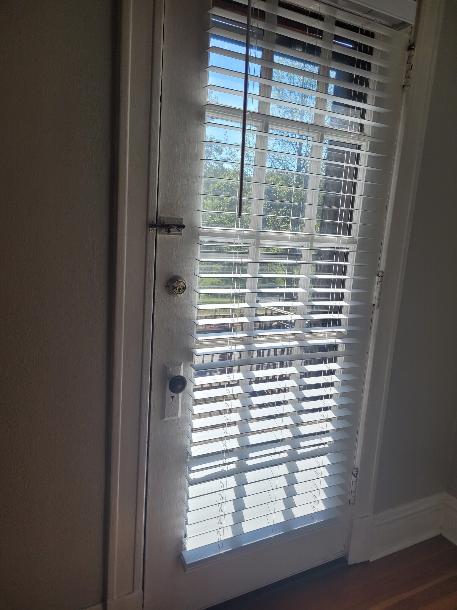 From the living room, access the balcony. - 2055 Alfred Ave