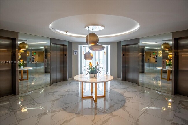 Building Photo - 10275 Collins Ave