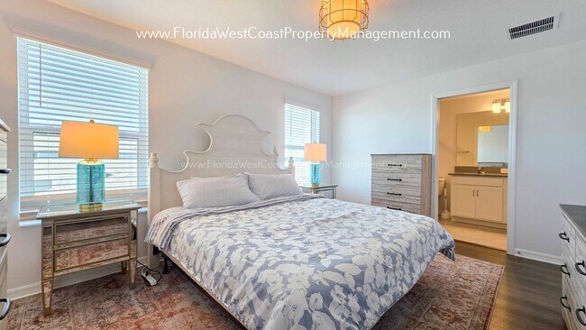 Building Photo - EXCEPTIONAL AND SPACIOUS FURNISHED TOWNHOME WITHIN WATERSIDE- NAUTIQUE!