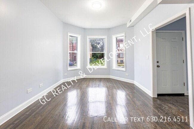 Building Photo - 6433 S Vernon Ave