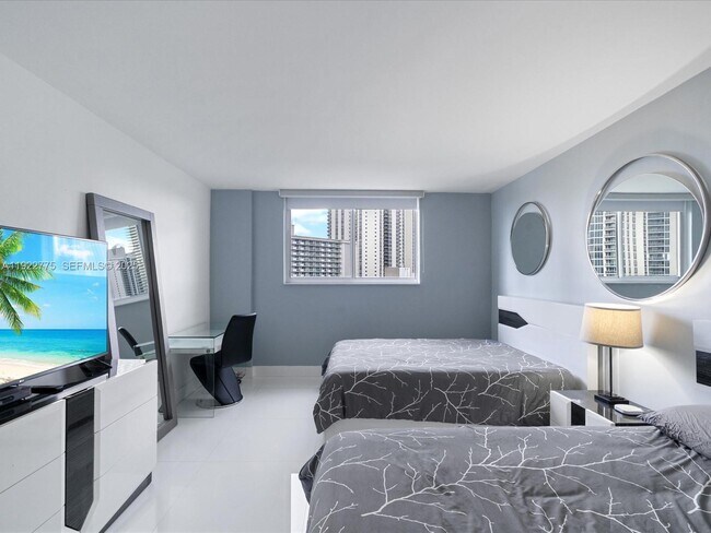 Building Photo - 19370 Collins Ave