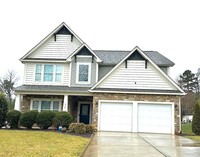 Building Photo - SPACIOUS FOUR BEDROOM