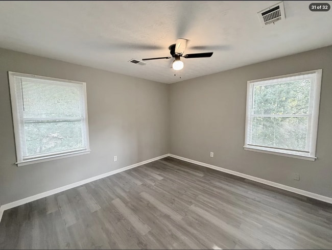 Building Photo - AVAILABLE NOW – FAIRBURN, GA 4 Bedrooms + Flexible Main-Level Living Space | Full Bathroom on Mai...