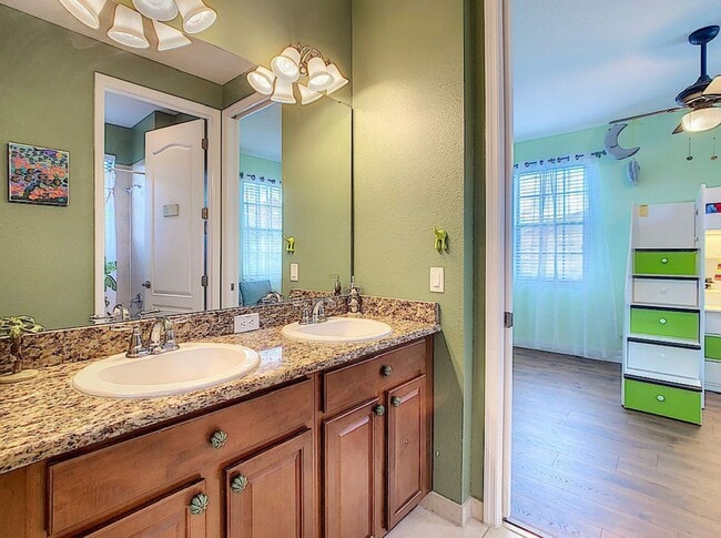 Building Photo - Luxury Living in Woodland Lakes Preserve: Fully-Furnished