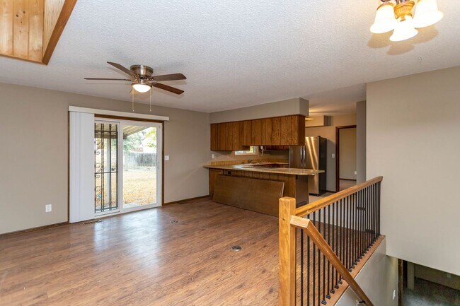 Building Photo - Comfortable Ranch-Style Living with Large Fenced Backyard!