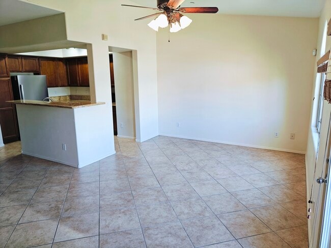 Living room at 2nd floor, all tiles. - 900 S 94th St