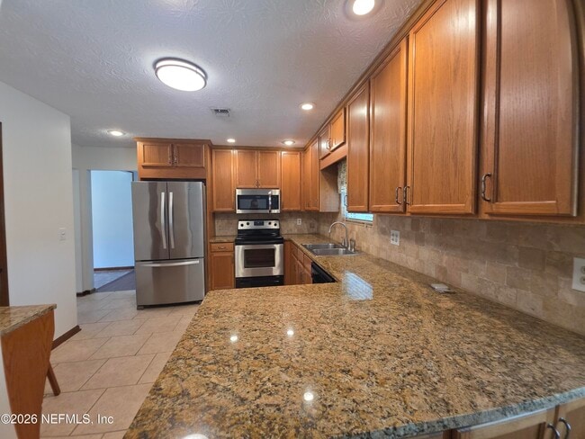 Building Photo - 8879 Heavenside Ct