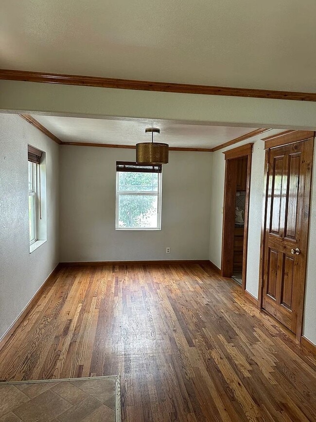 Building Photo - Ideally Located and Updated 4 Bed 2 Bath Fully-Fenced Home w/ Detached Garage/Shop!