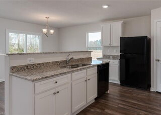 Building Photo - Spacious 3-Bedroom + Loft Home in Meredith Woods – Stylish, Efficient, and Perfect for Entertaining!