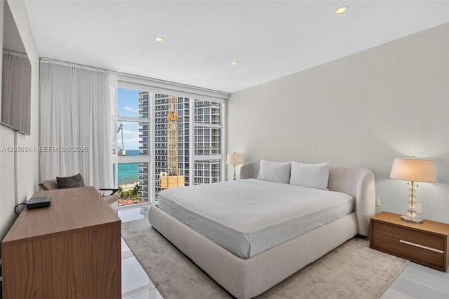 Building Photo - 10275 Collins Ave