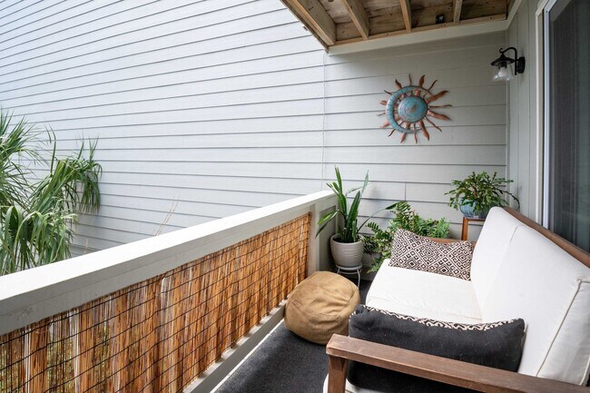 Building Photo - OFF-SEASON FURNISHED OASIS JUST STEPS FROM THE SAND