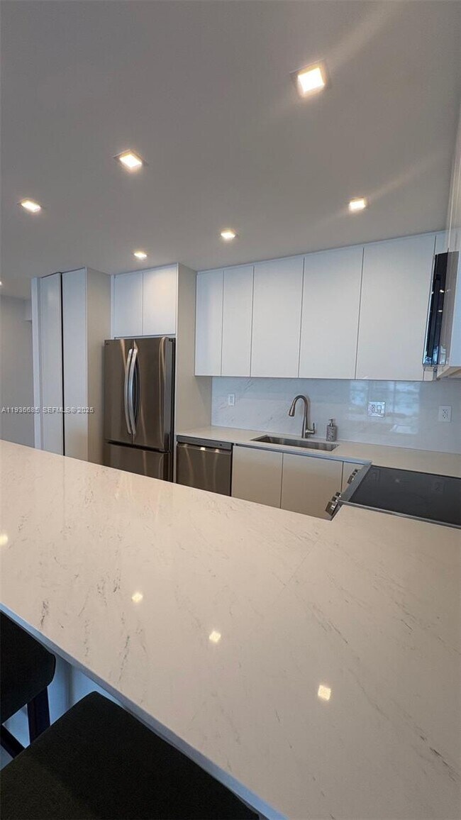 Building Photo - 19390 Collins Ave