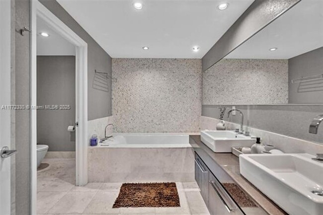 Building Photo - 17121 Collins Ave