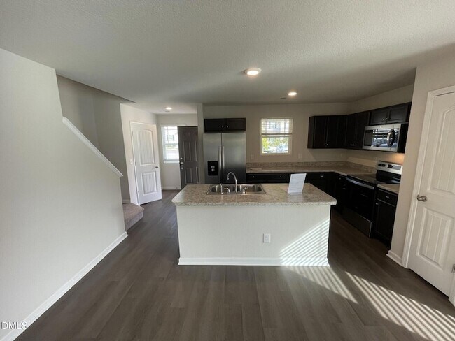 Building Photo - 2021 Wiggins Village Dr