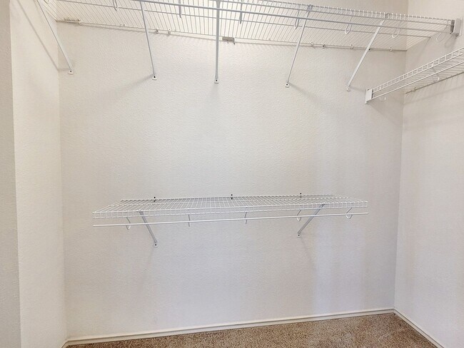 Building Photo - Inviting 3BR/2.5BA with Spacious Bedrooms & Great Outdoor Space