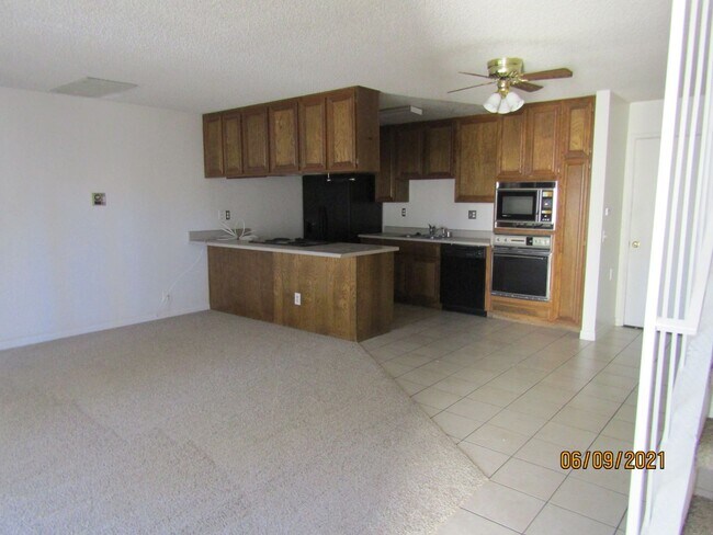 Building Photo - Centrally Located Large Two Story Condo wi...
