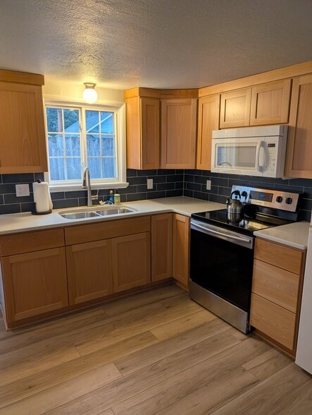 Newly renovated kitchen. - 251 NW Connell Ave