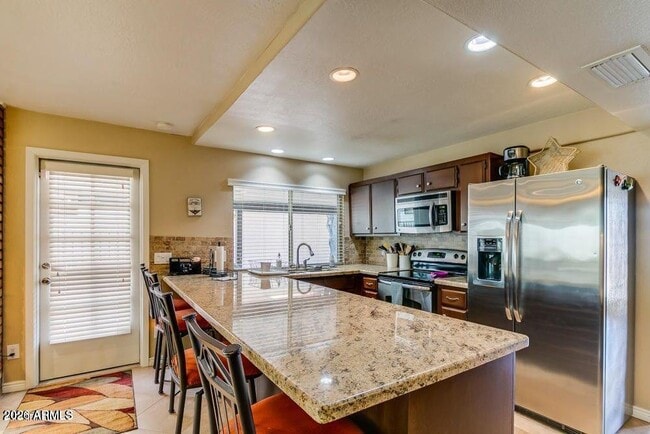 Building Photo - 7129 N Vía De Alegria