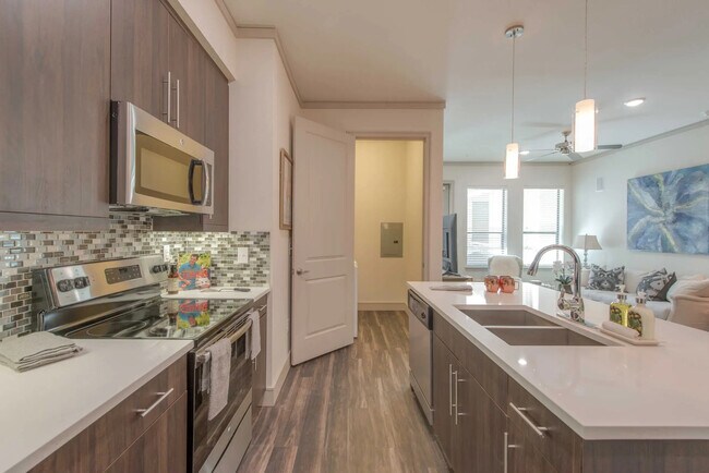 Building Photo - Experience the Art of Fine Apartment Living!