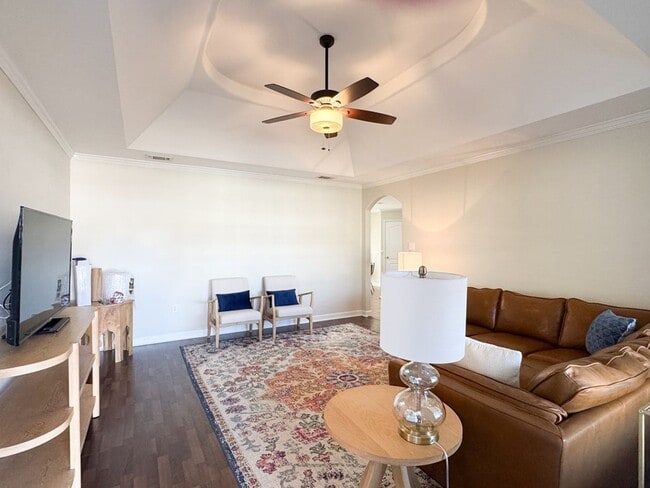 Building Photo - Spacious 3BR Home with Open Split Layout, Fenced Yard & Covered Front Porch