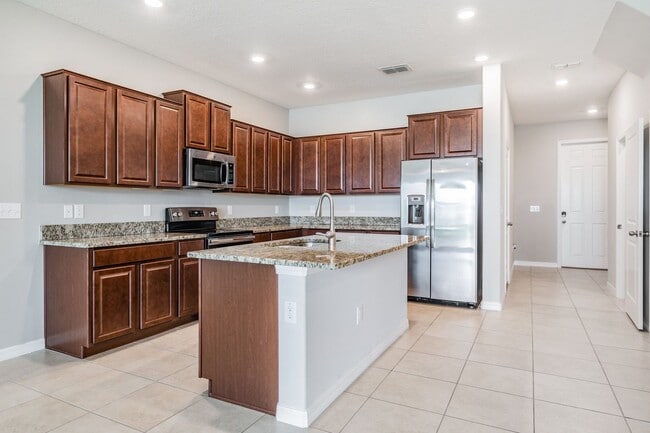 Building Photo - Feel Like You’re On Vacation In This Move-...