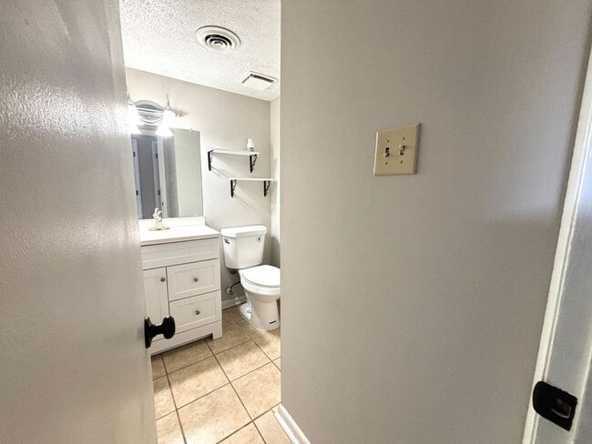 Building Photo - Available now. Water included! Great 2BR/1.5 BA Townhouse in Central James Island!