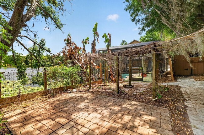 Building Photo - Available Now! Waterfront Living at Its Best – Pool, Decks & Gated Privacy