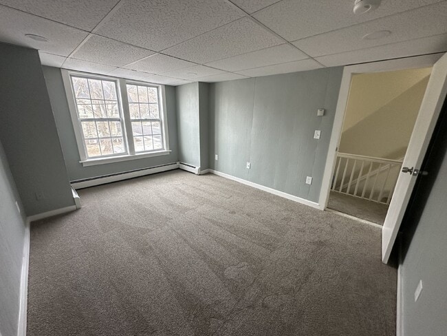 Building Photo - Recently Updated 3BR Townhouse | 2 Parking Spots | Prime Dover Location | $2,300/mo