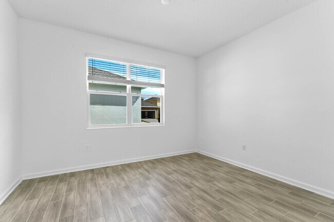 Building Photo - Modern Open-Concept Home with Designer Finishes and Community Amenities.