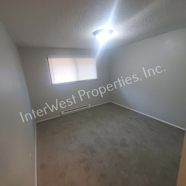 Building Photo - Beautiful Ranch Style Home on Very Large Corner Lot With W/D Hookups, Fireplace, 2 Car Garage & A...