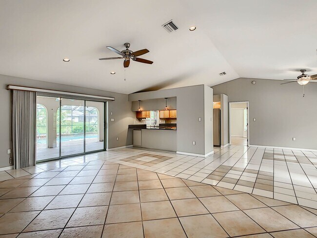 Building Photo - Port Charlotte Waterfront Pool Home - Grea...