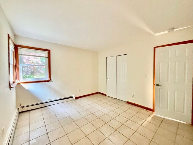 Main Bedroom View of Double Closets & Door - 46 Forrest Ave