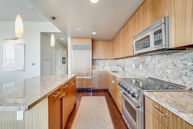 Building Photo - Gorgeous 3 Bedroom Condo with Huge Outdoor Space at Axis