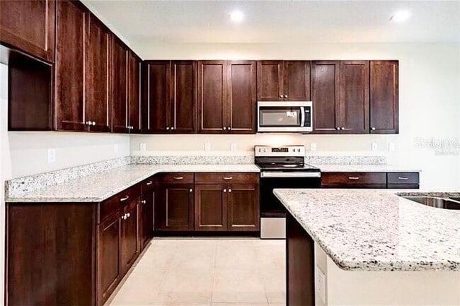 Building Photo - 6320 Tillandsia Pl