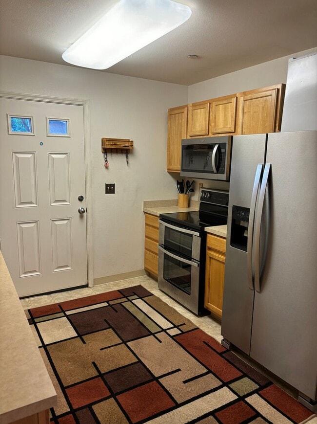 Building Photo - Move-In Ready 2BR/2BA Condo – Fully Furnished, AC, Washer/Dryer, 2 Parking stalls