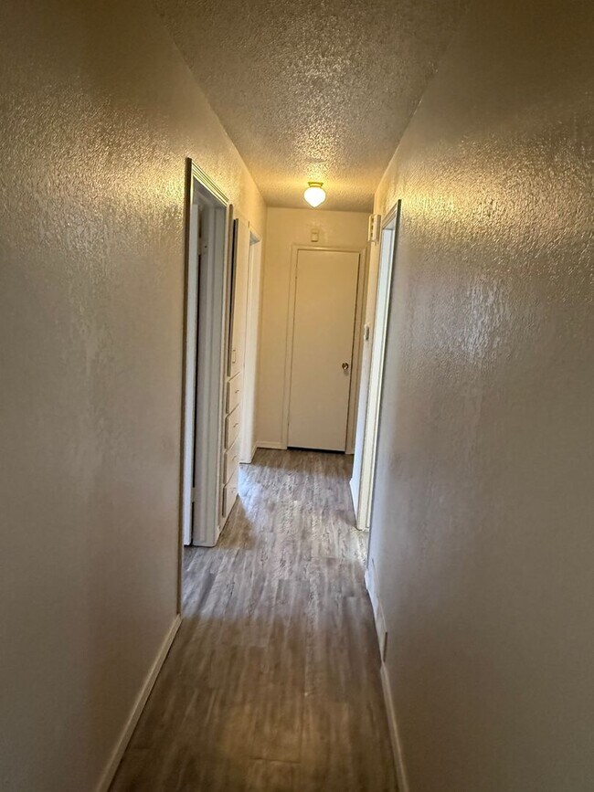 Building Photo - New paint and appliances, luxury vinyl plank and a fenced yard, these 3 beds 1.5 bath is ready fo...