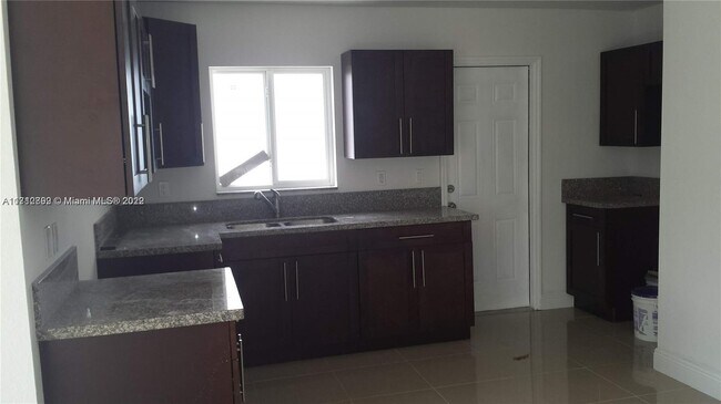 Building Photo - 657 NW 47th St