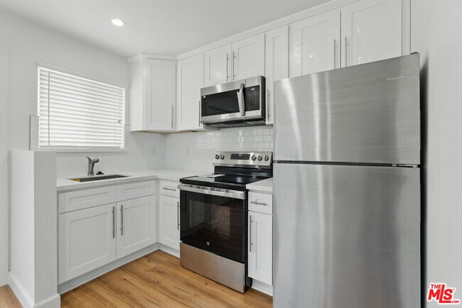 Building Photo - 1349 S Curson Ave