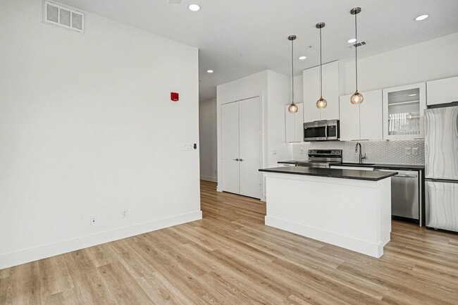 Building Photo - Be the first to live in Unit 207 at 2217 Fitzhugh—a brand-new 2026 construction offering 601 sq f...