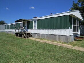 Building Photo - "Charming 3-Bed, 2-Bath Mobile Home Retrea...