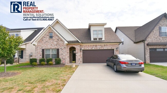 Building Photo - All brick 4 bedroom home plus Bonus room! Garage and covered patio!