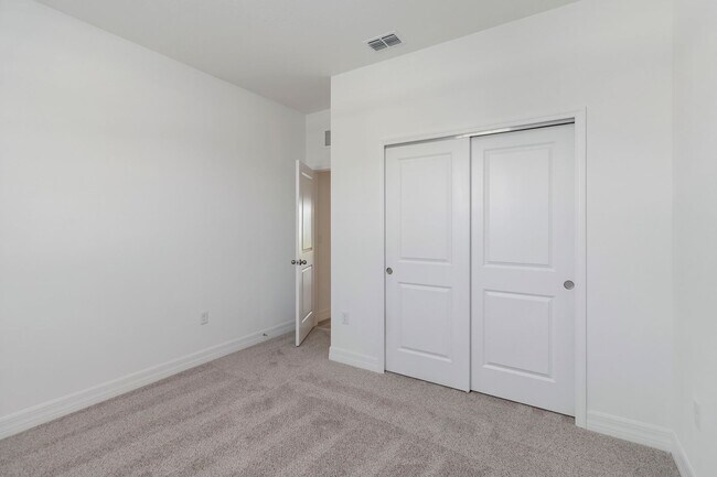 Building Photo - Beautiful Brand New Energy Efficient 4/2 C...