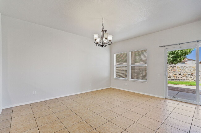 Building Photo - "Spacious 4-Bed Oasis with Granite Touches...