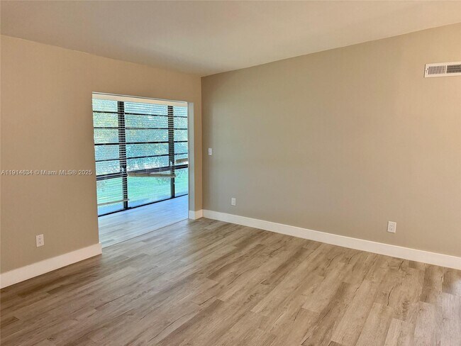 Building Photo - 9719 Hammocks Blvd